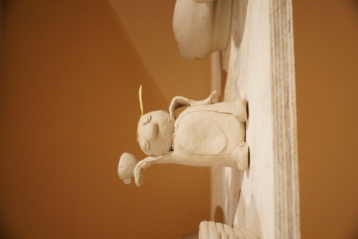 Close-up of a cute clay cat figurine