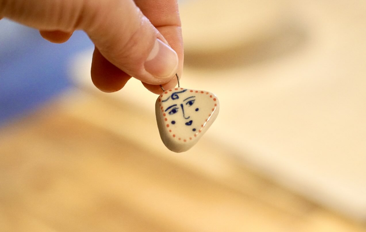 Handmade ceramic charms from a clay jewelry workshop in Irvine
